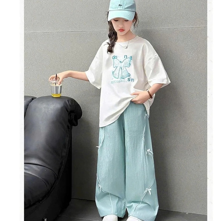 Alternative view of Set Bộ Đồ Bé Gái Áo Cotton In Nơ + Quần Dù Dài Dây Rút Viền Đính Nơ Từ 12-55kg Dành Cho Bé Gái